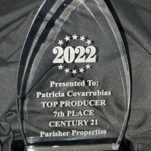 A clear glass award with the words " 2 0 2 2 " on it.