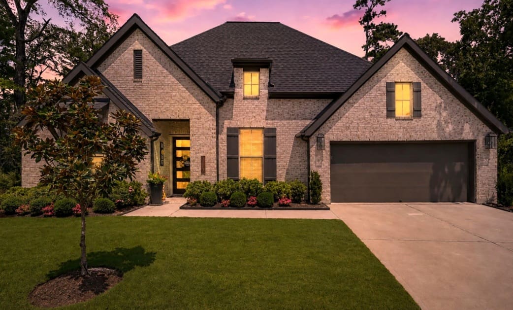Modern house with landscaped front yard.